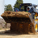 4 in one bucket lifting dirt and being used