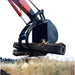 Amulet PowerBrute Hydraulic Thumb for Excavator carrying log