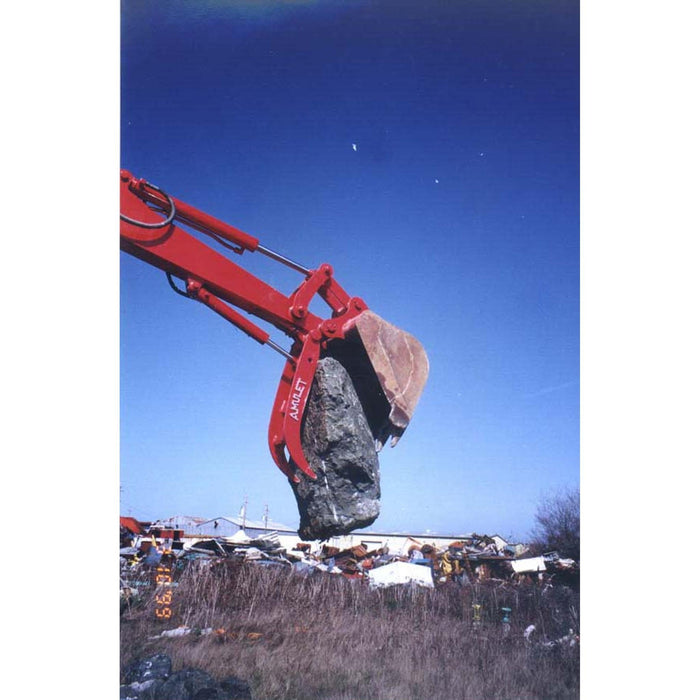 Amulet PowerBrute Hydraulic Thumb for Excavator carrying rock