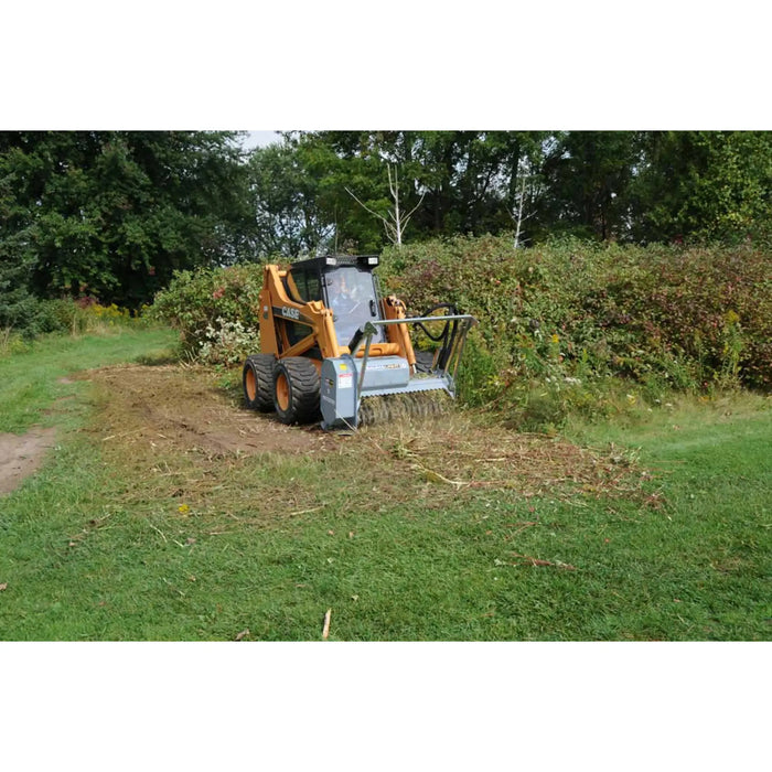 Brush mulcher on case skid steer