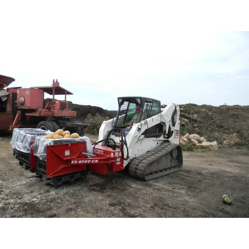 EZ SPOT UR Clamping Pallet Forks Skid Steer Attachment in action