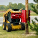 EZ SPOT UR Skid Steer Pole Setter in action