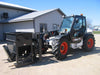 Haugen Attachments Concrete Hopper For Skid Steer Telehandler in action