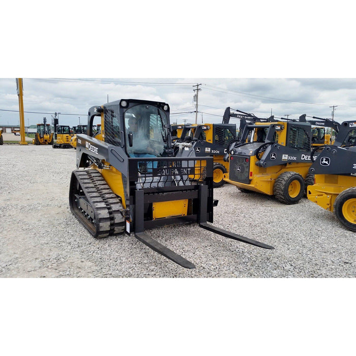 attachment for forklift on ground with many tractors in background