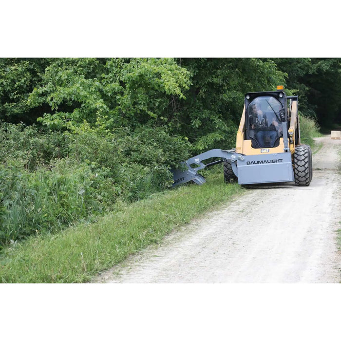 boom mower in forest