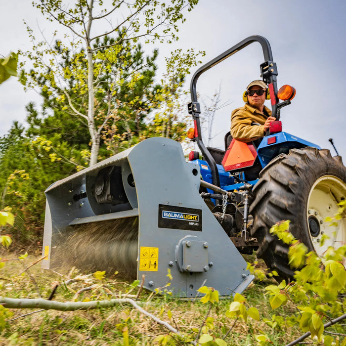 brush mulcher for tractor in field