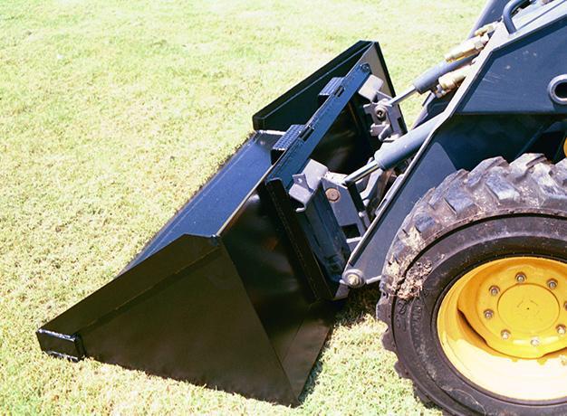 bucket for skid steer side view in action