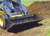 dirt bucket in field