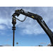 excavator auger in blue sky background