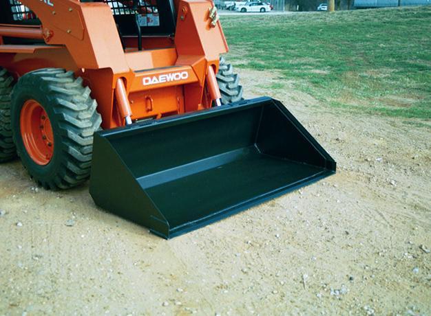 heavy duty skid steer bucket on ground half view