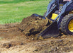 heavy duty skid steer in action with dirt