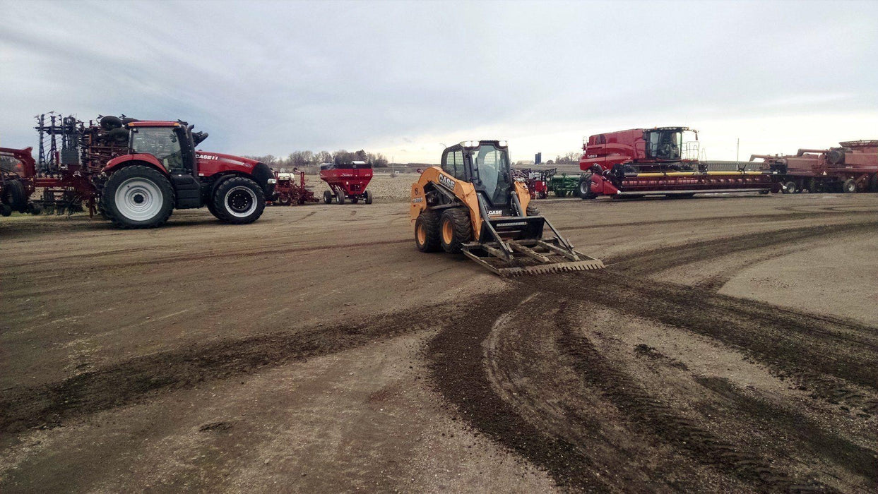 land leveler for skid steer in action