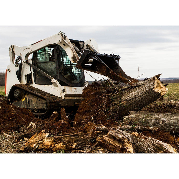 Loflin Fabrication Skid Steer Stump Bucket in action