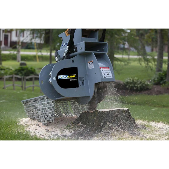 mini ex stump grinder in field