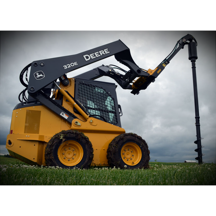 mini skid steer attachment side view in action