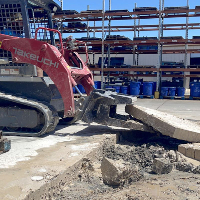 mini skid steer attachment slab eater on site in action