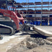 mini skid steer attachment slab eater on site in action