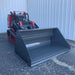 mini skid steer buckets on ground