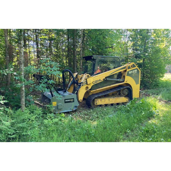 mulcher skid steer in forest