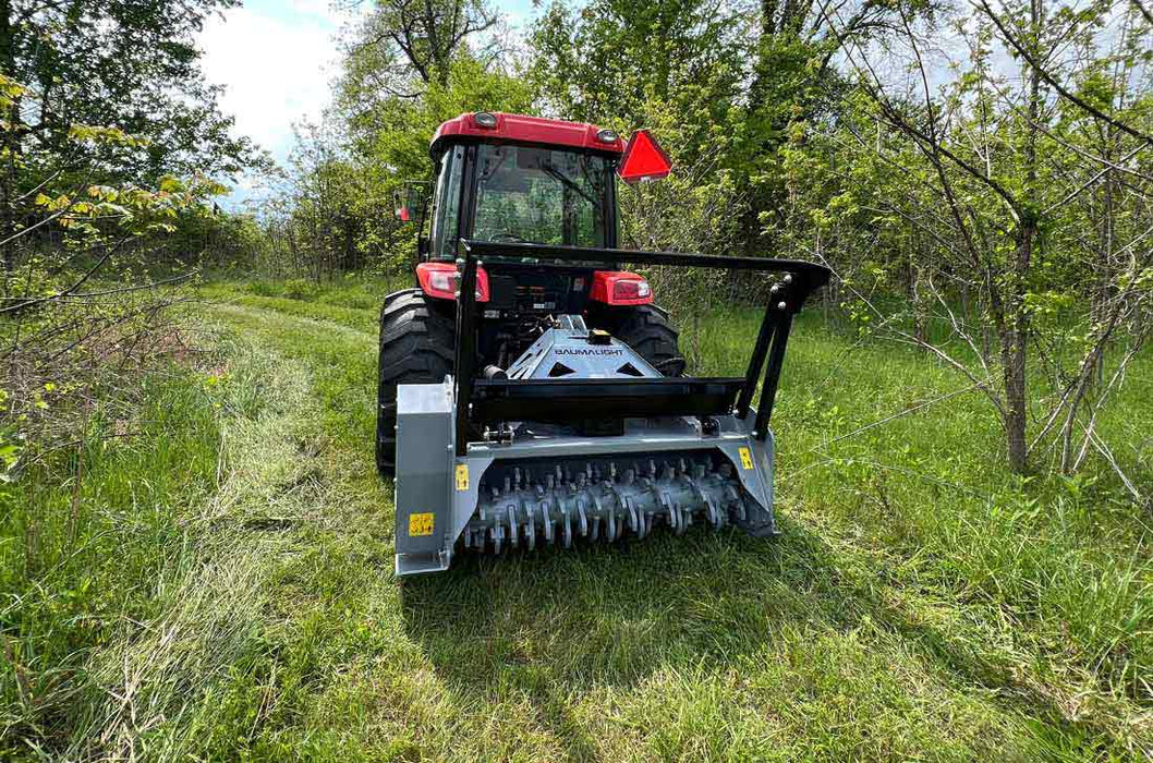 pto driven mulcher in field