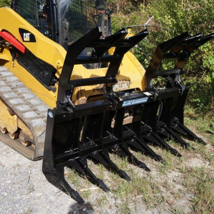 root grapple attachment mounted on skid steer