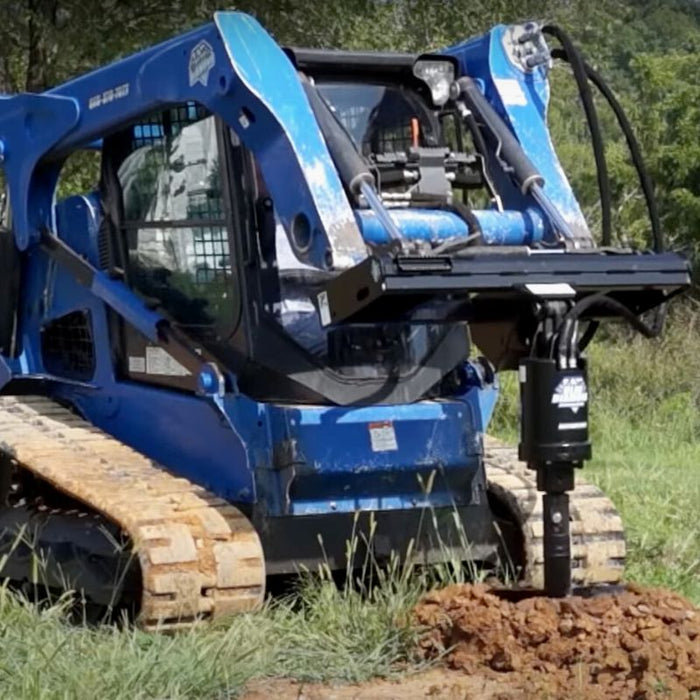 skid steer auger attachment in action