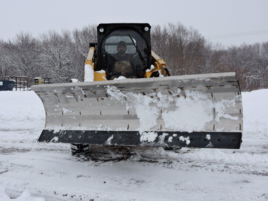 skid steer blade in action