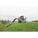 skid steer boom mower in action