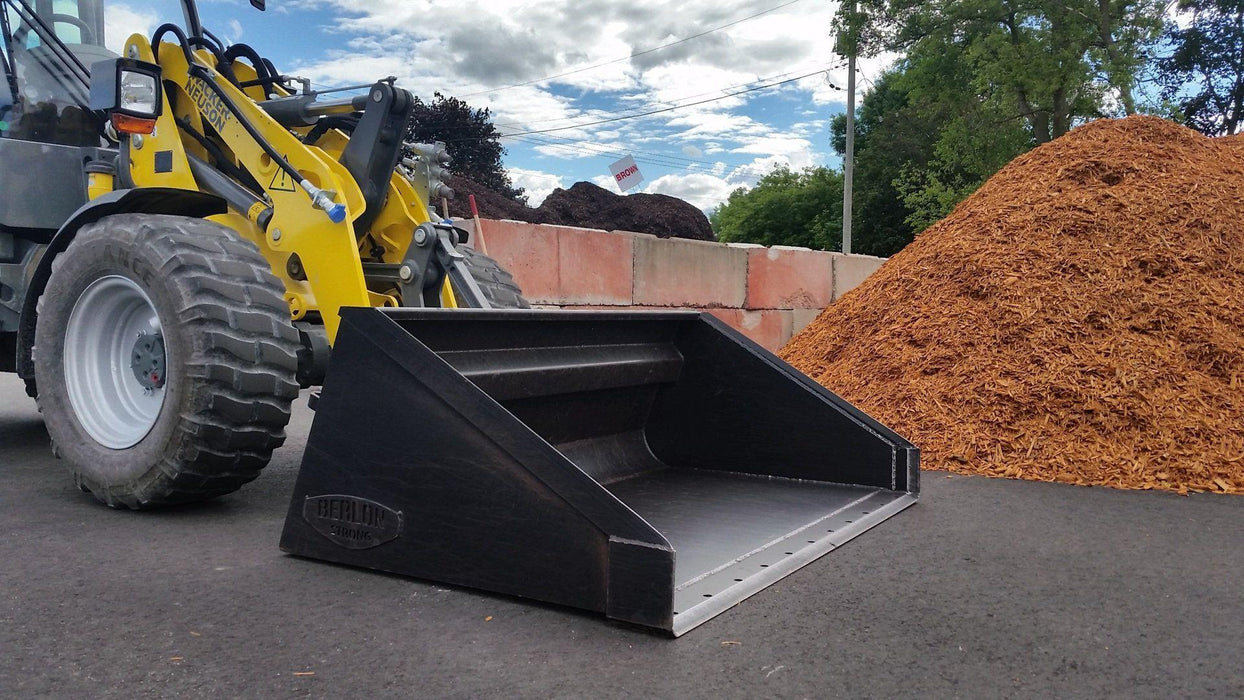 skid steer buckets half side view