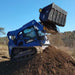 skid steer buckets in action