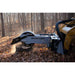 skid steer grinder attachment side view in forest