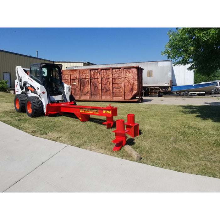 skid steer log splitter attachment extended on skid steer front left view