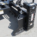 skid steer power rake attachment side view