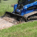 skid steer rock bucket in action