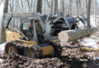 skid steer rock grapple in action