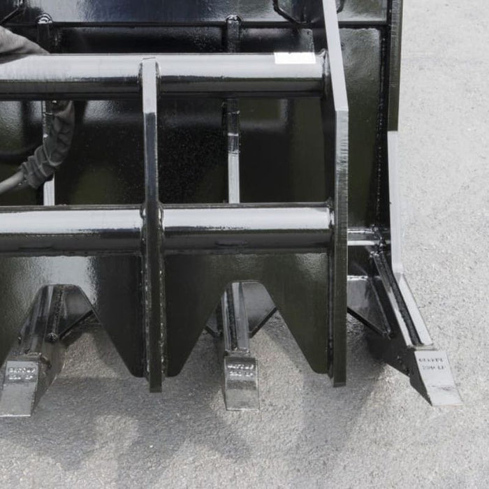 skid steer root grapple front view