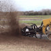 skid steer sweeper attachment in action