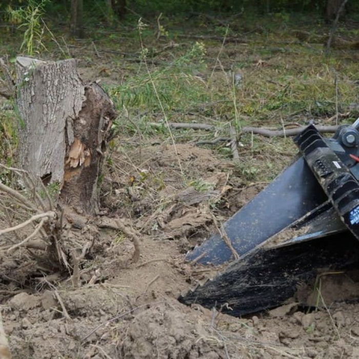 root bucket for skid steer forest background