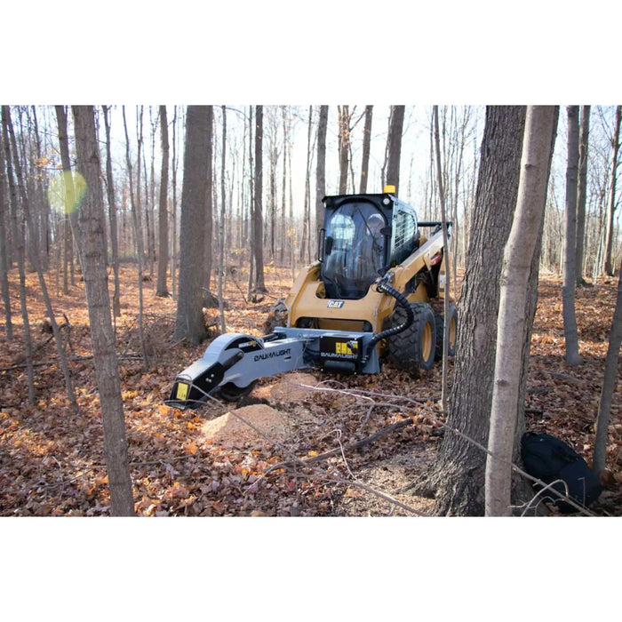 stump grinder attachment for skid steer in forest