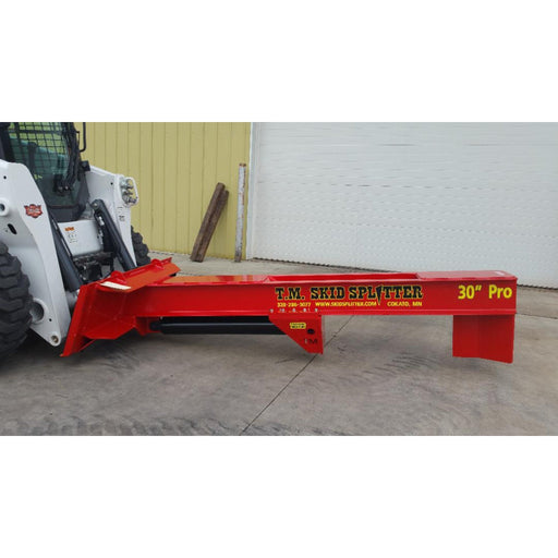 tm pro 1 skid steer log splitter attachment side view attached to skid steer 