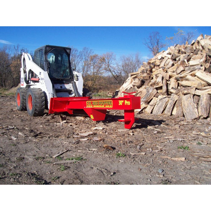 tm pro 2 skid steer log splitter attachment front left view attached to skid steer