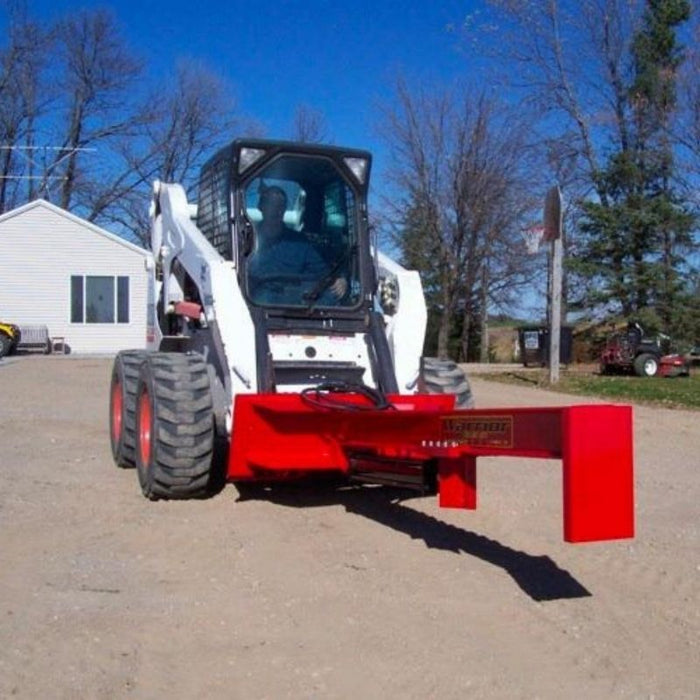 tm warrior skid steer wood splitter front view attached to skid steer