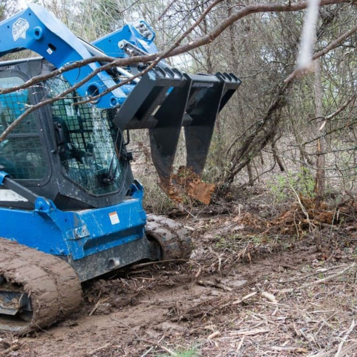 tree grubber for skid steer forest view