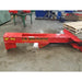 wood splitter attachment for skid steer right side view on ground